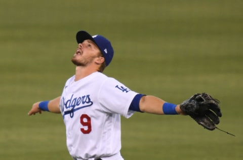 LOS ANGELES, CALIFORNIA - SEPTEMBER 02: Gavin Lux #9 of the Los Angeles Dodgers calls for the ball on an out of Daulton Varsho #12 of the Arizona Diamondbacks at Dodger Stadium on September 02, 2020 in Los Angeles, California. (Photo by Harry How/Getty Images)