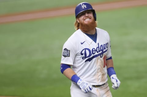 ARLINGTON, TEXAS - OCTOBER 27: Justin Turner #10 of the Los Angeles Dodgers reacts after flying out against the Tampa Bay Rays during the sixth inning in Game Six of the 2020 MLB World Series at Globe Life Field on October 27, 2020 in Arlington, Texas. (Photo by Tom Pennington/Getty Images)