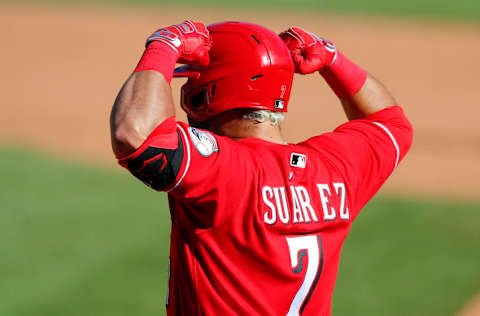 ATLANTA, GA - SEPTEMBER 30: Eugenio Suarez #7 of the Cincinnati Reds reacts after hitting a single in the thirteenth inning of Game One of the National League Wild Card Series against the Atlanta Braves at Truist Park on September 30, 2020 in Atlanta, Georgia. (Photo by Todd Kirkland/Getty Images)