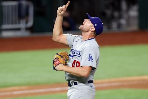 ARLINGTON, TEXAS – OCTOBER 25: Blake Treinen #49 of the Los Angeles Dodgers celebrates after striking out Willy Adames (not pictured) of the Tampa Bay Rays to secure the 4-2 victory in Game Five of the 2020 MLB World Series at Globe Life Field on October 25, 2020 in Arlington, Texas. (Photo by Tom Pennington/Getty Images)