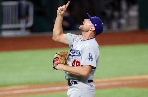 ARLINGTON, TEXAS - OCTOBER 25: Blake Treinen #49 of the Los Angeles Dodgers celebrates after striking out Willy Adames (not pictured) of the Tampa Bay Rays to secure the 4-2 victory in Game Five of the 2020 MLB World Series at Globe Life Field on October 25, 2020 in Arlington, Texas. (Photo by Tom Pennington/Getty Images)