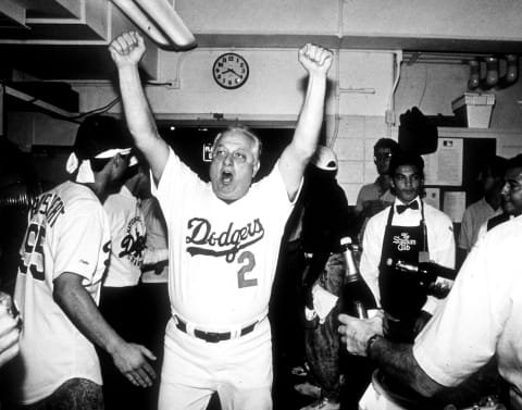 LOS ANGELES, CA – 1988 : Manager Tommy Lasorda #2 of the Los Angeles Dodgers celebrates after winning the 1988 NLDS at Dodger Stadium, Los Angeles, California. (Photo by Jayne Kamin-Oncea/Getty Images)