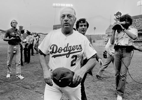 LOS ANGELES, CA – OCTOBER 25, 1981: Manager Tommy Lasorda #2 of the Los Angeles Dodgers walks off the field after defeating the New York Yankees in game 5 of the 1981 World Series at Dodger Stadium, Los Angeles, California. (Photo by Jayne Kamin-Oncea/Getty Images)