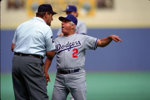 PITTSBURGH – 1980’s: Manager Tommy Lasorda #2 of the Los Angeles Dodgers argues with umpire Lee Weyer during a game against the Pittsburgh Pirates at Three Rivers Stadium circa 1985 in Pittsburgh, Pennsylvania. (Photo by George Gojkovich/Getty Images)