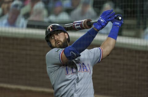 SEATTLE, WA - AUGUST 21: Joey Gallo #13 of the Texas Rangers warms up in the on deck circle before an at-bat in a game against the Seattle Mariners at T-Mobile Park on August, 21, 2020 in Seattle, Washington. The Mariners won 7-4. (Photo by Stephen Brashear/Getty Images)