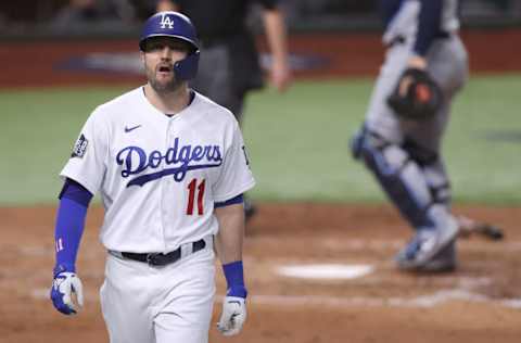 ARLINGTON, TEXAS - OCTOBER 27: A.J. Pollock #11 of the Los Angeles Dodgers reacts after lining out against the Tampa Bay Rays during the third inning in Game Six of the 2020 MLB World Series at Globe Life Field on October 27, 2020 in Arlington, Texas. (Photo by Tom Pennington/Getty Images)