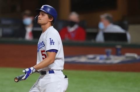 ARLINGTON, TEXAS - OCTOBER 27: Corey Seager #5 of the Los Angeles Dodgers reacts after striking out against the Tampa Bay Rays during the fourth inning in Game Six of the 2020 MLB World Series at Globe Life Field on October 27, 2020 in Arlington, Texas. (Photo by Ronald Martinez/Getty Images)