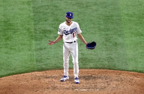 ARLINGTON, TEXAS - OCTOBER 20: Joe Kelly #17 of the Los Angeles Dodgers celebrate after closing out the teams 8-3 victory against the Tampa Bay Rays in Game One of the 2020 MLB World Series at Globe Life Field on October 20, 2020 in Arlington, Texas. (Photo by Sean M. Haffey/Getty Images)