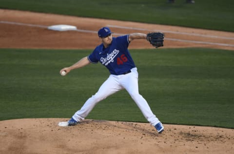 GOODYEAR, ARIZONA - MARCH 03: Corey Knebel #46 of the Los Angeles Dodgers delivers a pitch against the Cincinnati Reds during a spring training game at Camelback Ranch on March 03, 2021 in Goodyear, Arizona. (Photo by Norm Hall/Getty Images)