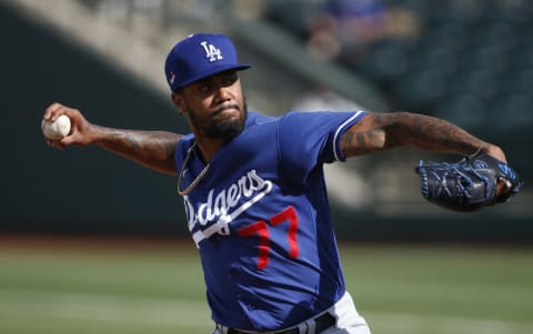 SURPRISE, ARIZONA – MARCH 07: Pitcher Dennis Santana #77 of the Los Angeles Dodgers throws against the Texas Rangers during the seventh inning of the MLB spring training baseball game at Surprise Stadium on March 07, 2021 in Surprise, Arizona. (Photo by Ralph Freso/Getty Images)