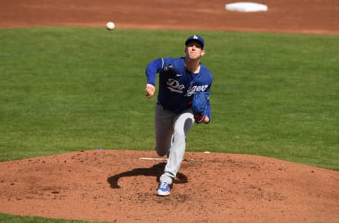 GOODYEAR, ARIZONA - MARCH 12: Walker Buehler #21 of the Los Angeles Dodgers delivers a pitch against the Cleveland Indians during a spring training game at Goodyear Ballpark on March 12, 2021 in Goodyear, Arizona. (Photo by Norm Hall/Getty Images)