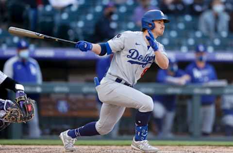 DENVER, CO - APRIL 1: Zach McKinstry #8 of the Los Angeles Dodgers watches his double during the eighth inning against the Colorado Rockies on Opening Day at Coors Field on April 1, 2021 in Denver, Colorado. The Rockies defeated the Dodgers 8-5. (Photo by Justin Edmonds/Getty Images)