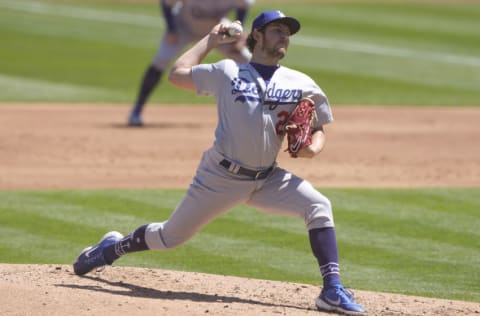 OAKLAND, CALIFORNIA - APRIL 07: Trevor Bauer #27 of the Los Angeles Dodgers pitches against the Oakland Athletics in the second inning at RingCentral Coliseum on April 07, 2021 in Oakland, California. (Photo by Thearon W. Henderson/Getty Images)