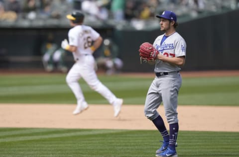 OAKLAND, CALIFORNIA - APRIL 07: Matt Chapman #26 of the Oakland Athletics trots around the bases after hitting a solo home run off of Trevor Bauer #27 of the Los Angeles Dodgers in the seventh inning at RingCentral Coliseum on April 07, 2021 in Oakland, California. (Photo by Thearon W. Henderson/Getty Images)