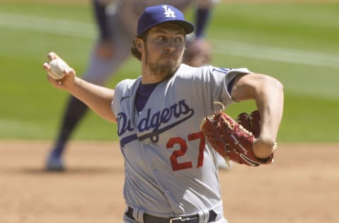 OAKLAND, CALIFORNIA - APRIL 07: Trevor Bauer #27 of the Los Angeles Dodgers pitches against the Oakland Athletics in the second inning at RingCentral Coliseum on April 07, 2021 in Oakland, California. (Photo by Thearon W. Henderson/Getty Images)