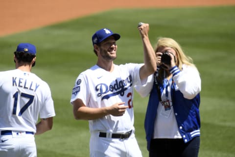 LOS ANGELES, CALIFORNIA – APRIL 09: Clayton Kershaw #22 of the Los Angeles Dodgers acknowledges the crowd after receiving his World Series ring prior to the game against the Washington Nationals at Dodger Stadium on April 09, 2021 in Los Angeles, California. (Photo by Harry How/Getty Images)