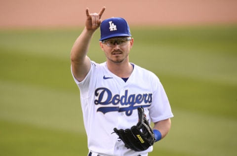 LOS ANGELES, CALIFORNIA - APRIL 10: Zach McKinstry #8 of the Los Angeles Dodgers motions to fans during the first inning against the Washington Nationals at Dodger Stadium on April 10, 2021 in Los Angeles, California. (Photo by Harry How/Getty Images)