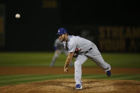 OAKLAND, CA – April 6: Clayton Kershaw #22 of the Los Angeles Dodgers pitches during the game against the Oakland Athletics at RingCentral Coliseum on April 6, 2021 in Oakland, California. The Dodgers defeated the Athletics 5-1. (Photo by Michael Zagaris/Oakland Athletics/Getty Images)