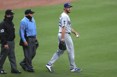 SAN DIEGO, CALIFORNIA - APRIL 17: Clayton Kershaw #22 of the Los Angeles Dodgers looks on after returning to the field after a catchers interference call during the fourth inning of a game against the San Diego Padres at PETCO Park on April 17, 2021 in San Diego, California. (Photo by Sean M. Haffey/Getty Images)