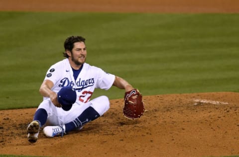 LOS ANGELES, CALIFORNIA - APRIL 24: Trevor Bauer #27 of the Los Angeles Dodgers reacts after a line drive single from Eric Hosmer #30 of the San Diego Padres during the sixth inning at Dodger Stadium on April 24, 2021 in Los Angeles, California. (Photo by Harry How/Getty Images)