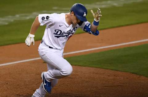 LOS ANGELES, CA - APRIL 27: Will Smith #16 of the Los Angeles Dodgers heads to first after hitting a three run home run in the fourth inning of the game against the Cincinnati Reds at Dodger Stadium on April 27, 2021 in Los Angeles, California. (Photo by Jayne Kamin-Oncea/Getty Images)