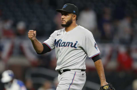 ATLANTA, GA - APRIL 12: Yimi Garcia #93 of the Miami Marlins reacts at the conclusion of an MLB game against the Atlanta Braves at Truist Park on April 12, 2021 in Atlanta, Georgia. (Photo by Todd Kirkland/Getty Images)