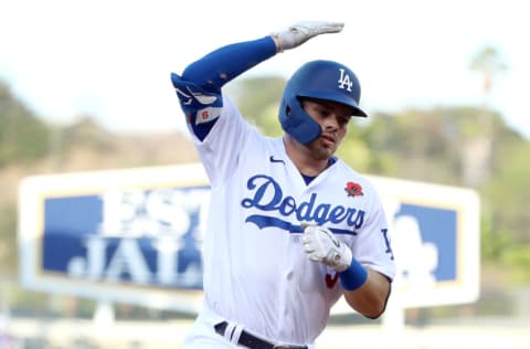 LOS ANGELES, CALIFORNIA - MAY 31: Gavin Lux #9 of the Los Angeles Dodgers celebrates his home run during the second inning against the St. Louis Cardinals at Dodger Stadium on May 31, 2021 in Los Angeles, California. (Photo by Katelyn Mulcahy/Getty Images)