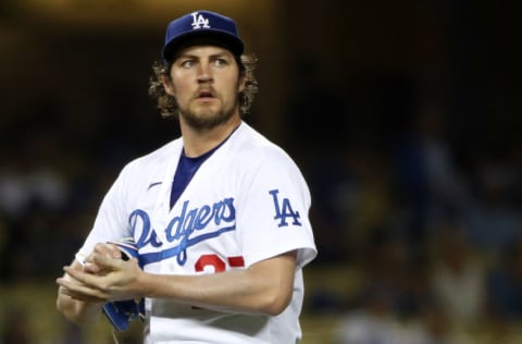 LOS ANGELES, CALIFORNIA - JUNE 12: Trevor Bauer #27 of the Los Angeles Dodgers looks on after giving up a hit to Joey Gallo #13 of the Texas Rangers during the fifth inning at Dodger Stadium on June 12, 2021 in Los Angeles, California. (Photo by Katelyn Mulcahy/Getty Images)