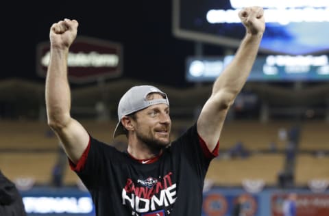 LOS ANGELES, CALIFORNIA - OCTOBER 09: Max Scherzer #31 of the Washington Nationals celebrates defeating the Los Angeles Dodgers 7-3 in ten innings to win game five and the National League Division Series at Dodger Stadium on October 09, 2019 in Los Angeles, California. (Photo by Sean M. Haffey/Getty Images)