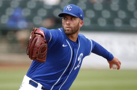 SURPRISE, ARIZONA - MARCH 25: Starting pitcher Danny Duffy #30 of the Kansas City Royals throws against the Arizona Diamondbacks during the third inning of the MLB spring training baseball game at Surprise Stadium on March 25, 2021 in Surprise, Arizona. (Photo by Ralph Freso/Getty Images)