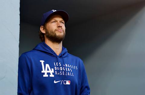 LOS ANGELES, CALIFORNIA - JUNE 29: Clayton Kershaw #22 of the Los Angeles Dodgers walks into the dugout prior to a game against the San Francisco Giants at Dodger Stadium on June 29, 2021 in Los Angeles, California. (Photo by Michael Owens/Getty Images)