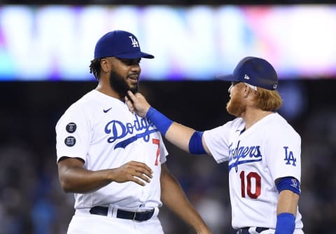 Justin Turner #10 of the Los Angeles Dodgers pulls on the beard of closer Kenley Jansen #74 of the Los Angeles Dodgers (Photo by Kevork Djansezian/Getty Images)