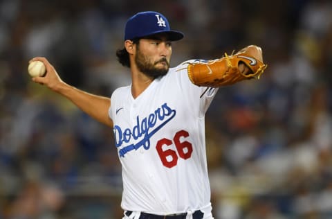 LOS ANGELES, CA - AUGUST 18: Mitch White #66 of the Los Angeles Dodgers pitches in the third inning of the game against the Pittsburgh Pirates at Dodger Stadium on August 18, 2021 in Los Angeles, California. (Photo by Jayne Kamin-Oncea/Getty Images)