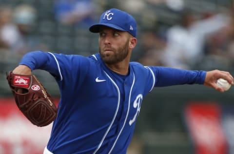 SURPRISE, ARIZONA - MARCH 25: Starting pitcher Danny Duffy #30 of the Kansas City Royals throws against the Arizona Diamondbacks during the third inning of the MLB spring training baseball game at Surprise Stadium on March 25, 2021 in Surprise, Arizona. (Photo by Ralph Freso/Getty Images)