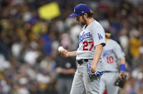 SAN DIEGO, CALIFORNIA - JUNE 23: Trevor Bauer #27 of the Los Angeles Dodgers looks on after allowing a solo homerun to Victor Caratini #17 of the San Diego Padres during the seventh inning of a game at PETCO Park on June 23, 2021 in San Diego, California. (Photo by Sean M. Haffey/Getty Images)