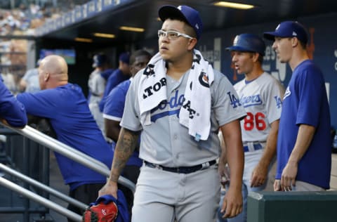 NEW YORK, NEW YORK - AUGUST 13: Julio Urias #7 of the Los Angeles Dodgers looks on before a game against the New York Mets at Citi Field on August 13, 2021 in New York City. The Dodgers defeated the Mets 6-5 in ten innings. (Photo by Jim McIsaac/Getty Images)