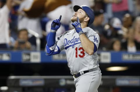 NEW YORK, NEW YORK - AUGUST 15: Max Muncy #13 of the Los Angeles Dodgers reacts on the base paths after his two-run home run against the New York Mets in the sixth inning at Citi Field on August 15, 2021 in New York City. (Photo by Jim McIsaac/Getty Images)