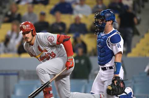 LOS ANGELES, CALIFORNIA - JUNE 01: Nolan Arenado #28 of the St. Louis Cardinals reacts after an inside pitch in front of Will Smith #16 of the Los Angeles Dodgers during the third inning at Dodger Stadium on June 01, 2021 in Los Angeles, California. (Photo by Harry How/Getty Images)