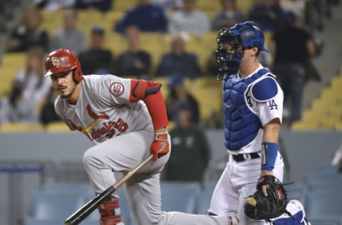 LOS ANGELES, CALIFORNIA - JUNE 01: Nolan Arenado #28 of the St. Louis Cardinals reacts after an inside pitch in front of Will Smith #16 of the Los Angeles Dodgers during the third inning at Dodger Stadium on June 01, 2021 in Los Angeles, California. (Photo by Harry How/Getty Images)