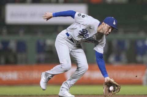 SAN FRANCISCO, CALIFORNIA - SEPTEMBER 04: Trea Turner #6 of the Los Angeles Dodgers goes down to field a ground ball off the bat of Austin Slater #13 of the San Francisco Giants in the bottom of the fifth inning at Oracle Park on September 04, 2021 in San Francisco, California. (Photo by Thearon W. Henderson/Getty Images)