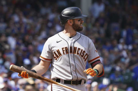 CHICAGO, ILLINOIS - SEPTEMBER 10: Evan Longoria #10 of the San Francisco Giants reacts after striking out against the Chicago Cubs at Wrigley Field on September 10, 2021 in Chicago, Illinois. (Photo by Nuccio DiNuzzo/Getty Images)