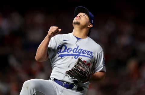 SAN FRANCISCO, CALIFORNIA - OCTOBER 09: Brusdar Graterol #48 of the Los Angeles Dodgers celebrates after the eighth inning against the San Francisco Giants during Game 2 of the National League Division Series at Oracle Park on October 09, 2021 in San Francisco, California. (Photo by Ezra Shaw/Getty Images)