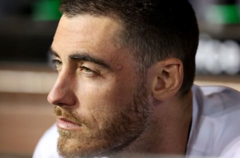 LOS ANGELES, CALIFORNIA - OCTOBER 11: Cody Bellinger #35 of the Los Angeles Dodgers looks on from the dugout against the San Francisco Giants during the sixth inning in game 3 of the National League Division Series at Dodger Stadium on October 11, 2021 in Los Angeles, California. (Photo by Ronald Martinez/Getty Images)