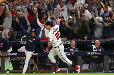 ATLANTA, GEORGIA - OCTOBER 17: Joc Pederson #22 of the Atlanta Braves runs up the first base line after he a two run home run against the Los Angeles Dodgers in the fourth inning of Game Two of the National League Championship Series at Truist Park on October 17, 2021 in Atlanta, Georgia. (Photo by Kevin C. Cox/Getty Images)