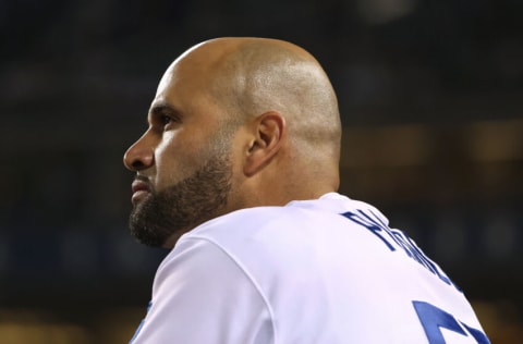 LOS ANGELES, CALIFORNIA - OCTOBER 21: Albert Pujols #55 of the Los Angeles Dodgers looks on to the field during an 11-2 win over the Atlanta Braves during game five of the National League Championship Series at Dodger Stadium on October 21, 2021 in Los Angeles, California. (Photo by Harry How/Getty Images)