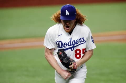 ARLINGTON, TEXAS - OCTOBER 18: Dustin May #85 of the Los Angeles Dodgers reacts after retiring the side against the Atlanta Braves during the first inning in Game Seven of the National League Championship Series at Globe Life Field on October 18, 2020 in Arlington, Texas. (Photo by Tom Pennington/Getty Images)