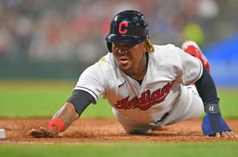 CLEVELAND, OHIO - SEPTEMBER 24: Jose Ramirez #11 of the Cleveland Indians dives back to first base during the fourth inning against the Chicago White Sox at Progressive Field on September 24, 2021 in Cleveland, Ohio. (Photo by Jason Miller/Getty Images)