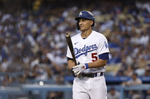 LOS ANGELES, CALIFORNIA - OCTOBER 02: Corey Seager #5 of the Los Angeles Dodgers reacts after striking out against the Milwaukee Brewers during the first inning at Dodger Stadium on October 02, 2021 in Los Angeles, California. (Photo by Michael Owens/Getty Images)