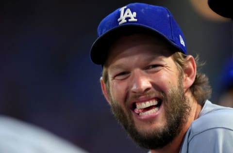 ARLINGTON, TX - AUGUST 28: Clayton Kershaw #22 of the Los Angeles Dodgers looks on from the dugout as the Los Angeles Dodgers take on the Texas Rangers in the bottom of the second inning at Globe Life Park in Arlington on August 28, 2018 in Arlington, Texas. (Photo by Tom Pennington/Getty Images)