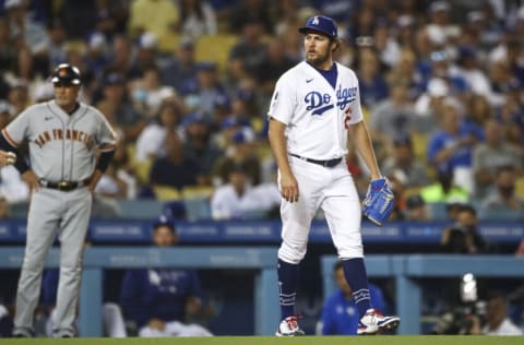 LOS ANGELES, CALIFORNIA - JUNE 28: Trevor Bauer #27 of the Los Angeles Dodgers looks on during the sixth inning against the San Francisco Giants at Dodger Stadium on June 28, 2021 in Los Angeles, California. (Photo by Meg Oliphant/Getty Images)